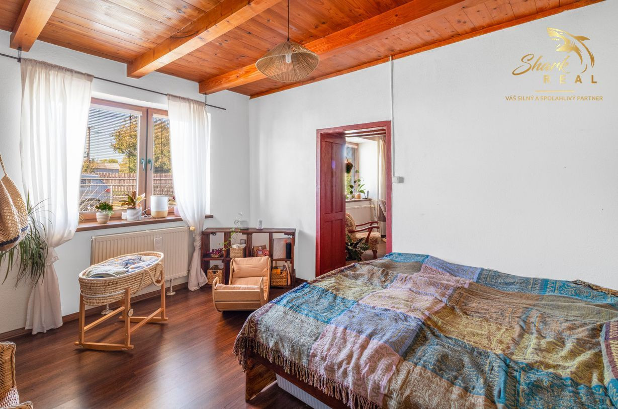 Príjemný 3-izbový dom s veľkým pozemkom 