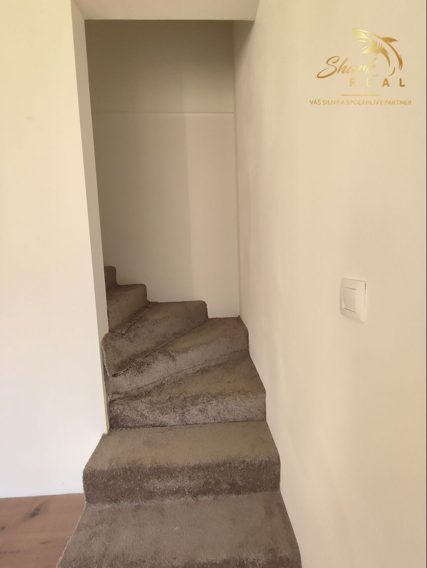 Byt v novostavbe so záhradou neďaleko tajchu Nová Baňa