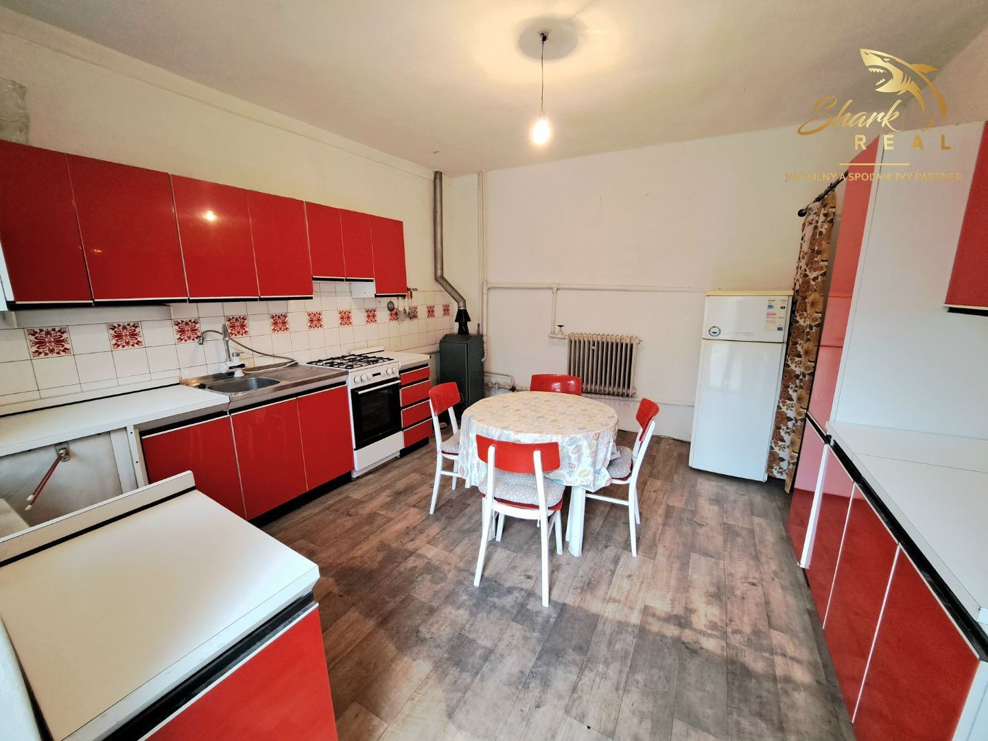 Rodinný dom s pozemkom vhodným na podnikanie