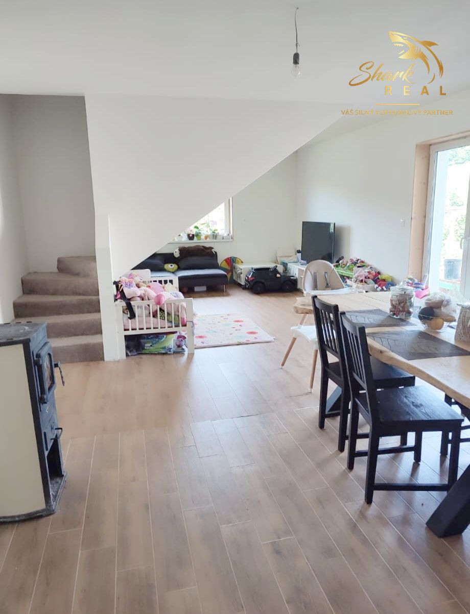 Byt v novostavbe so záhradou neďaleko tajchu a centra mesta