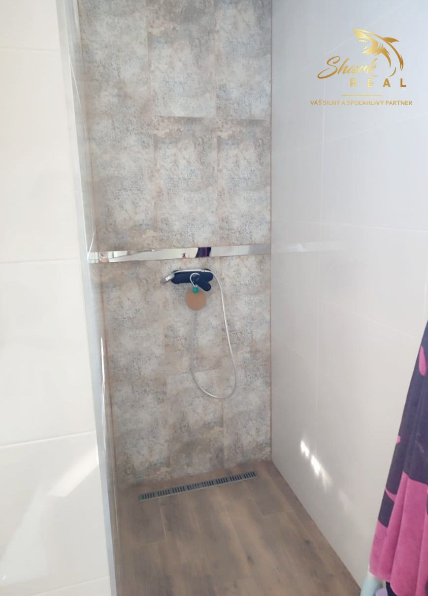 Byt v novostavbe so záhradou neďaleko tajchu a centra mesta