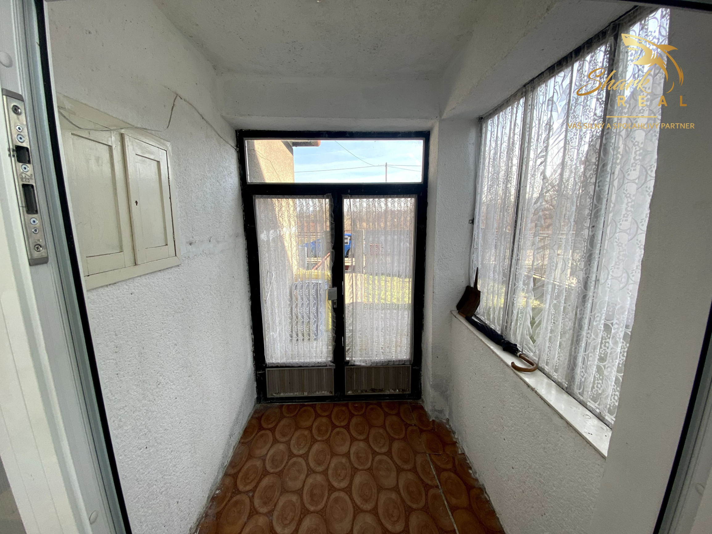 Rodinný dom s veľkým pozemkom na predmestí Hlohovca