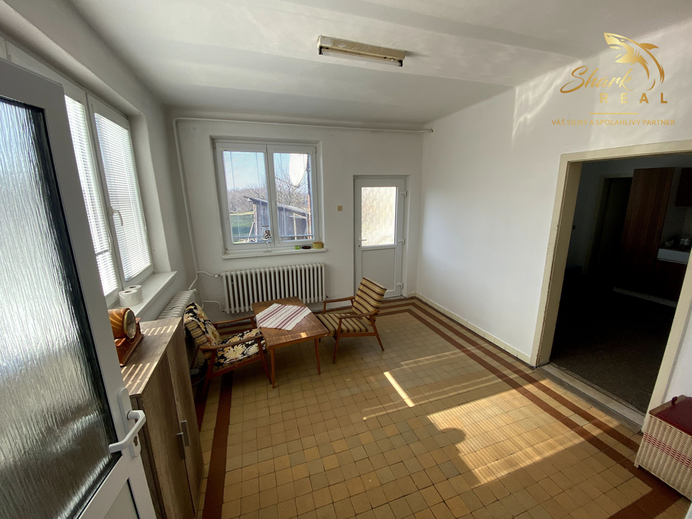 Rodinný dom s veľkým pozemkom na predmestí Hlohovca