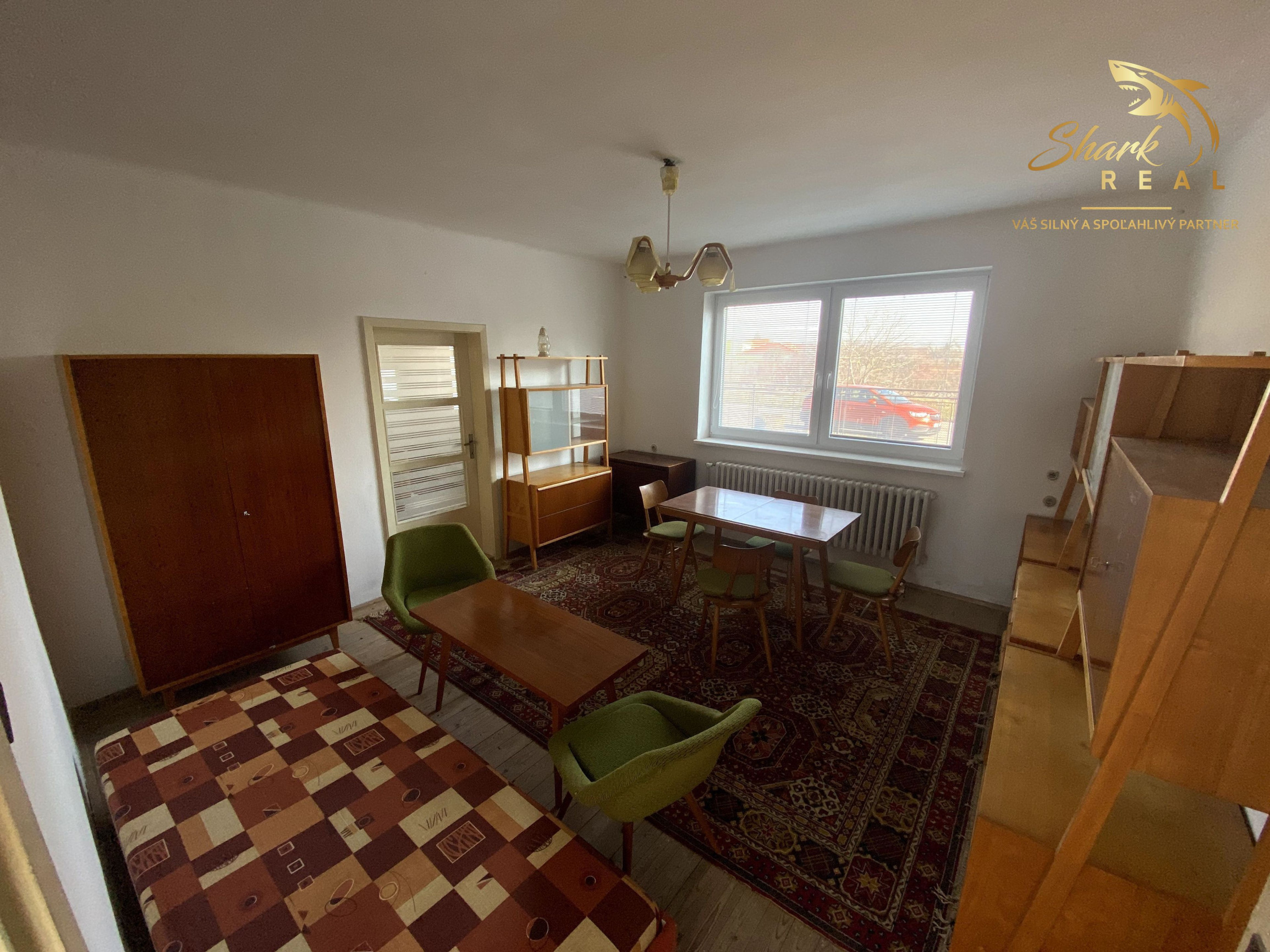 Rodinný dom s veľkým pozemkom na predmestí Hlohovca