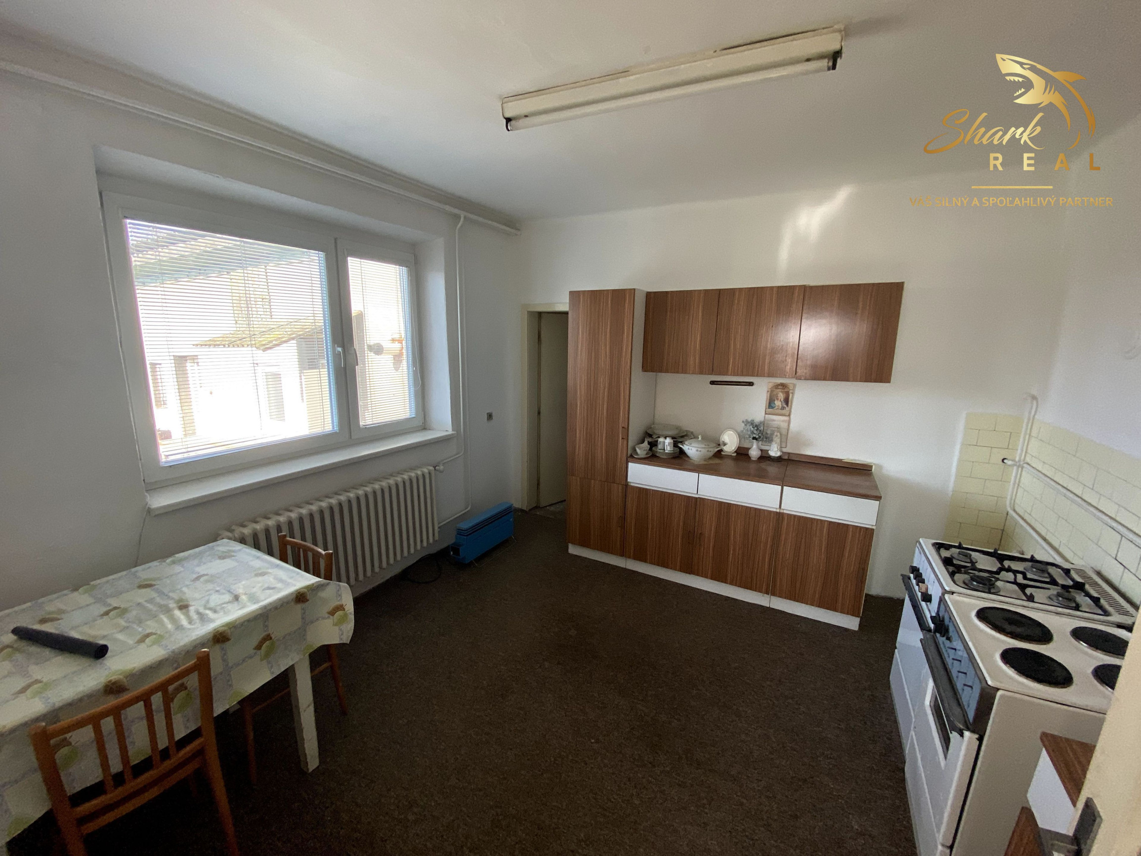 Rodinný dom s veľkým pozemkom na predmestí Hlohovca