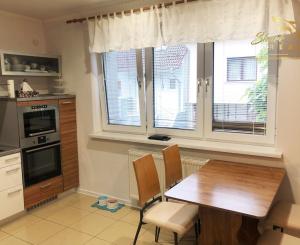 Jedinečná apartmánová nehnutelnosť s bazénom a záhradou