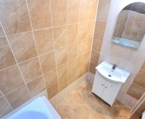 4-IZBOVÝ BYT PO KOMPLETNEJ REKONŠTRUKCII S GARÁŽOU A ZÁHRADKOU V OBCI HRAŇ