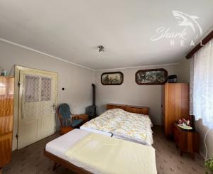 REZERVOVANÉ - RD - Chalupa pri potôčiku / Nová Baňa