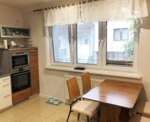 Jedinečná apartmánová nehnutelnosť s bazénom a záhradou