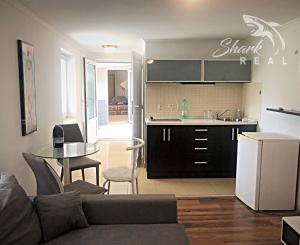 Jedinečná apartmánová nehnutelnosť s bazénom a záhradou