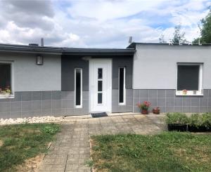 Jedinečná apartmánová nehnutelnosť s bazénom a záhradou