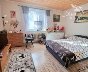 Rodinný dom s prístavbou 