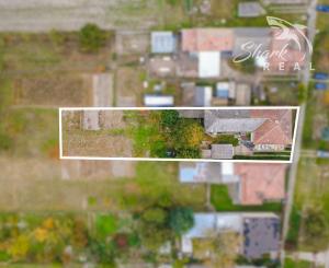 Priestranný 5-izbový dom s veľkým pozemkom v obci Iža