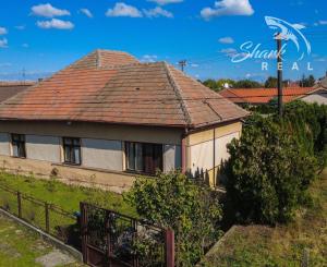 Na predaj 6-izbový rodinný dom s veľkým pozemkom v Komjaticiach