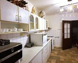 Priestranný dom so záhradou