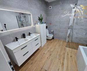 EXKLUZÍVNE NA PREDAJ: moderná 4-izbová novostavba v dvojdome v obľúbených Lužiankach pri Nitre. 