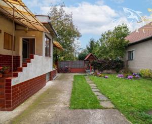 Rodinný dom s pekným pozemkom 