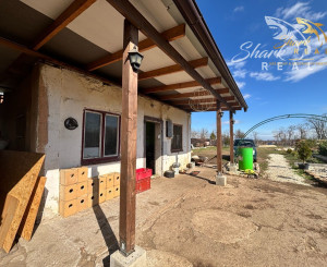 Záhrada s mobilným domčekom