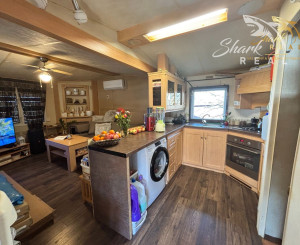 Záhrada s mobilným domčekom