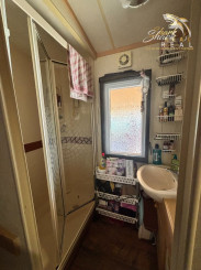 Záhrada s mobilným domčekom