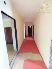 Stavebný pozemok so starším domom na predaj 