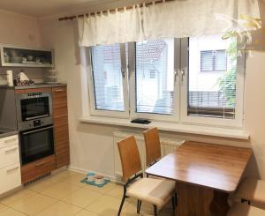 Jedinečná apartmánová nehnutelnosť s bazénom a záhradou