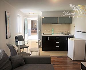 Jedinečná apartmánová nehnutelnosť s bazénom a záhradou