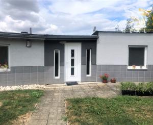 Jedinečná apartmánová nehnutelnosť s bazénom a záhradou