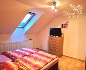 ZNÍŽENÁ CENA - Útulný rodinný dom s veľkou upravenou záhradou