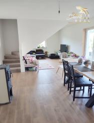 Byt v novostavbe so záhradou neďaleko tajchu a centra mesta