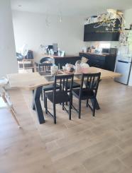 Byt v novostavbe so záhradou neďaleko tajchu a centra mesta