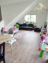 Byt v novostavbe so záhradou neďaleko tajchu a centra mesta