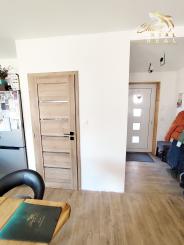 Byt v novostavbe so záhradou neďaleko tajchu a centra mesta