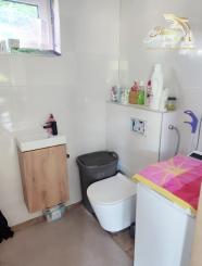 Byt v novostavbe so záhradou neďaleko tajchu a centra mesta