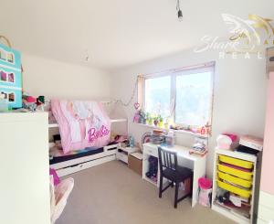 Byt v novostavbe so záhradou neďaleko tajchu a centra mesta