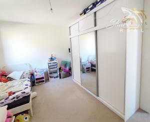 Byt v novostavbe so záhradou neďaleko tajchu a centra mesta