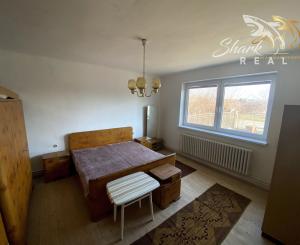 Rodinný dom s veľkým pozemkom na predmestí Hlohovca