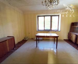 Stavebný pozemok so starším domom a predaj 