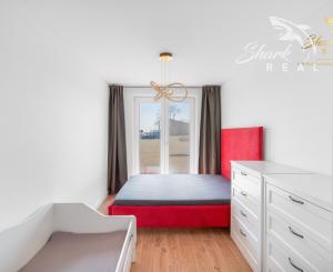 Moderný rodinný dom v radovej zástavbe v obci Malý Lapáš