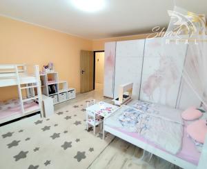 NOVINKA! Moderný 4-izbový byt s garážou, bazénom a záhradou