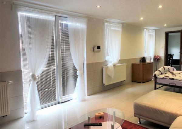 Jedinečná apartmánová nehnutelnosť s bazénom a záhradou