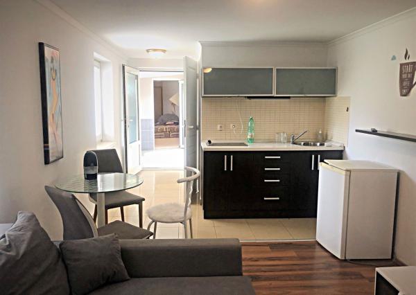 Jedinečná apartmánová nehnutelnosť s bazénom a záhradou