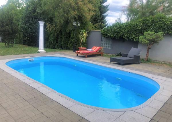 Jedinečná apartmánová nehnutelnosť s bazénom a záhradou