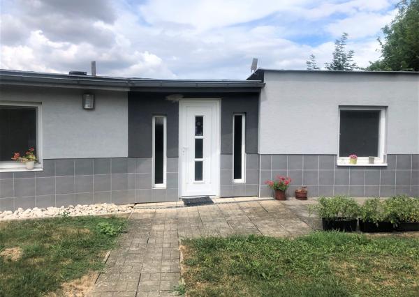 Jedinečná apartmánová nehnutelnosť s bazénom a záhradou