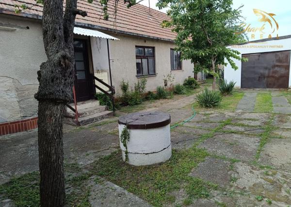 Starší dom s veľkým pozemkom na predaj