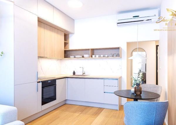 LUXUSNÝ a NOVÝ 2i byt s terasou a krytým parkovaním