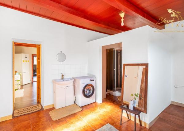 Príjemný 3-izbový dom s veľkým pozemkom 