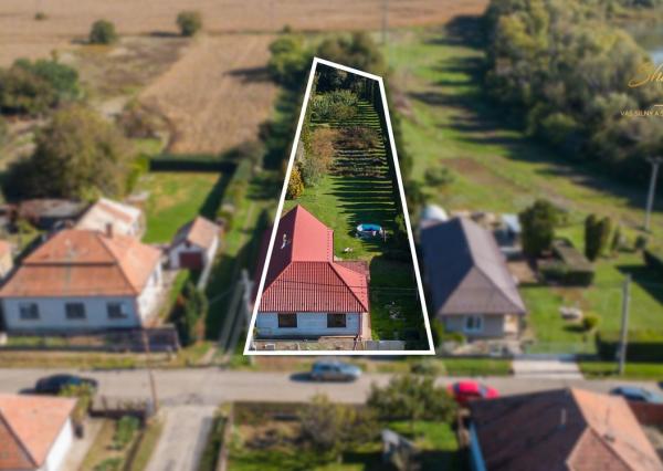 Príjemný 3-izbový dom s veľkým pozemkom 