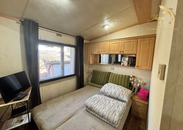 Záhrada s mobilným domčekom