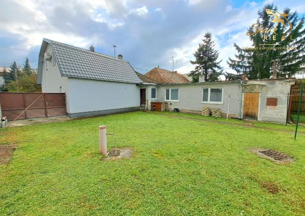 Starší domček s krásnym pozemkom